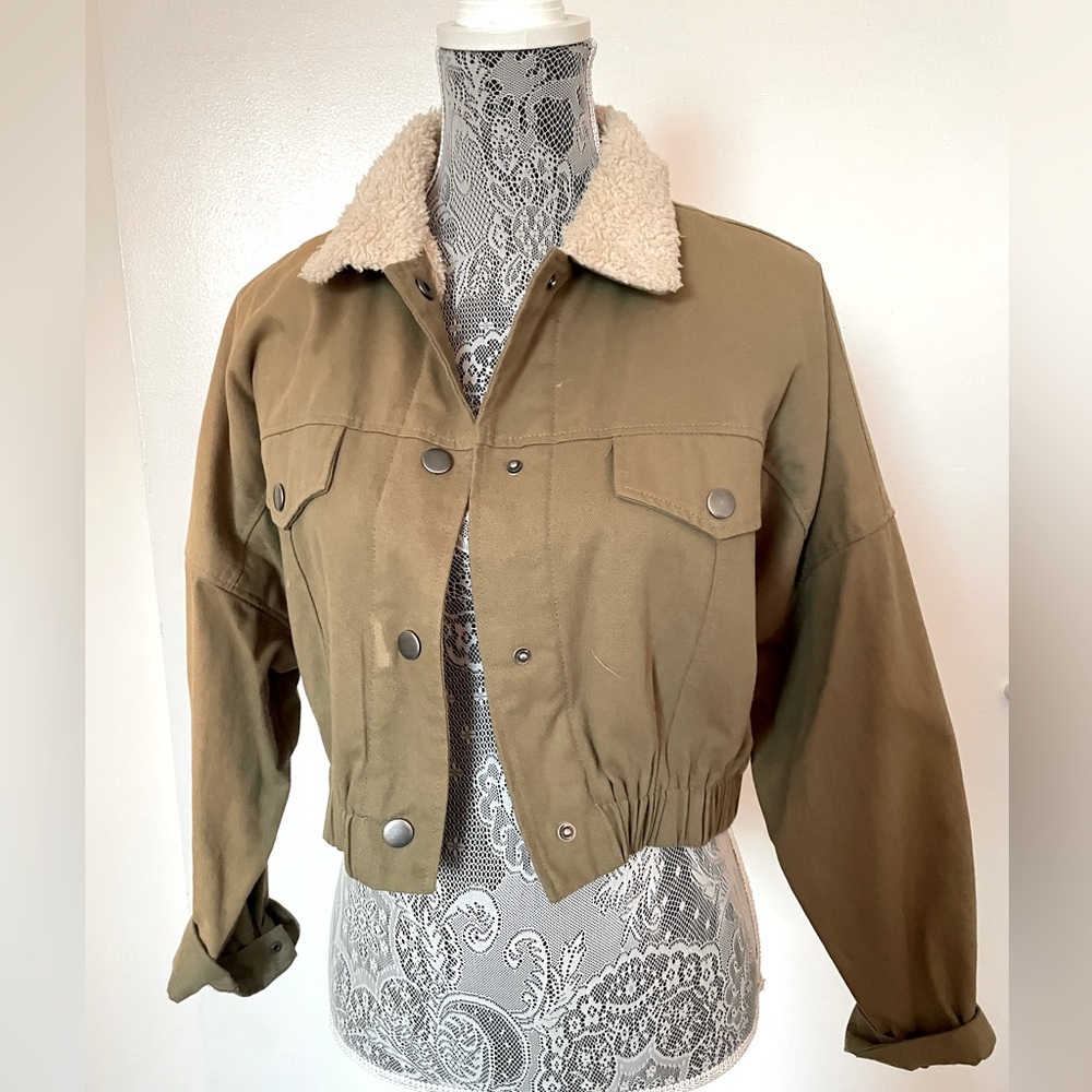 Olive green bomber jacket with furry lining